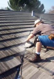 San Rose roofing contractor cuts tile to size