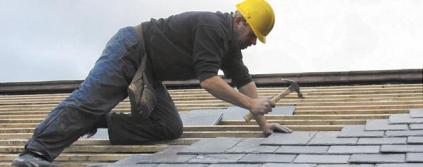 San Ramon roofer appling a new set of shingles